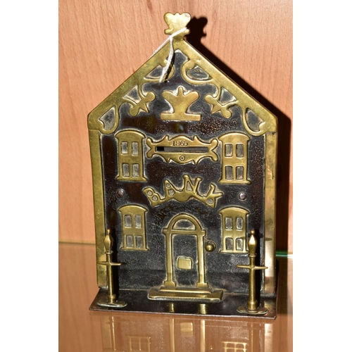 382 - A VICTORIAN BRASS MONEY BANK 1865, height approximately 19.5cm