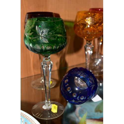 395 - A SET OF SIX HARLEQUIN HOCK GLASSES, etched with berries and foliage (6)