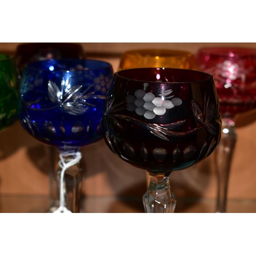 395 - A SET OF SIX HARLEQUIN HOCK GLASSES, etched with berries and foliage (6)