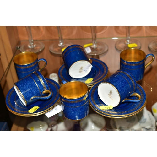 399 - SIX WEDGWOOD COFFEE CANS AND SAUCERS, gilt detailing and interior on blue ground, X8943 to base (12)... 