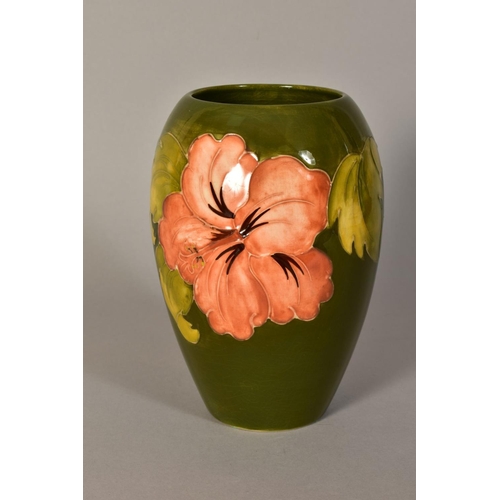 448 - A MOORCROFT POTTERY VASE, 'Hibiscus' pattern on green ground, impressed backstamp and painted signat... 