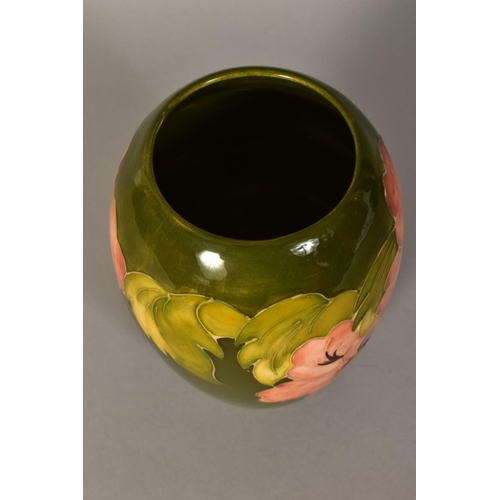 448 - A MOORCROFT POTTERY VASE, 'Hibiscus' pattern on green ground, impressed backstamp and painted signat... 