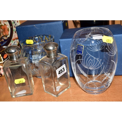 453 - FIVE ITEMS OF GLASSWARE, comprising two silver topped glass scent bottles (one cracked), two boxed R... 