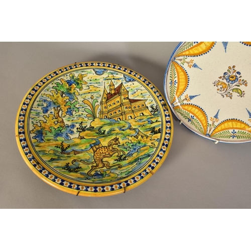 465 - A 19TH CENTURY MAIOLICA CHARGER, painted with a border of blue and yellow dots, the centre with a la... 