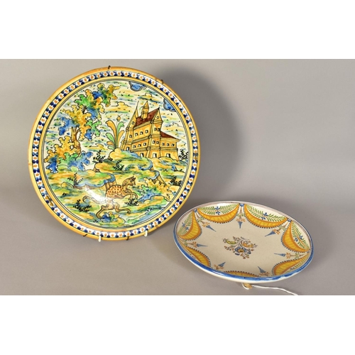 465 - A 19TH CENTURY MAIOLICA CHARGER, painted with a border of blue and yellow dots, the centre with a la... 