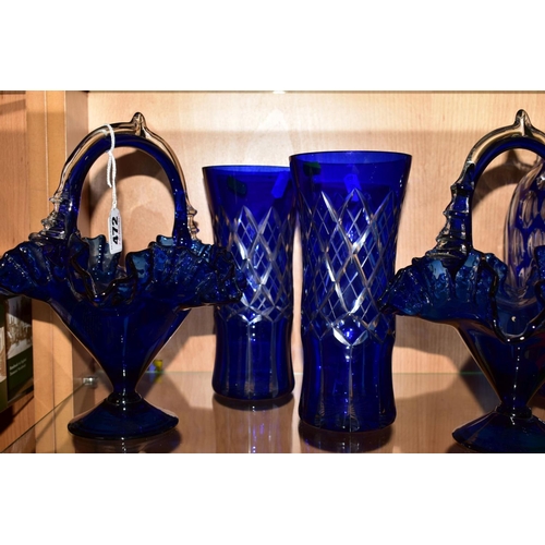 472 - A PAIR OF MODERN BLUE GLASS BASKETS with wavy edges, approximate height 26cm, a pair of cut blue gla... 