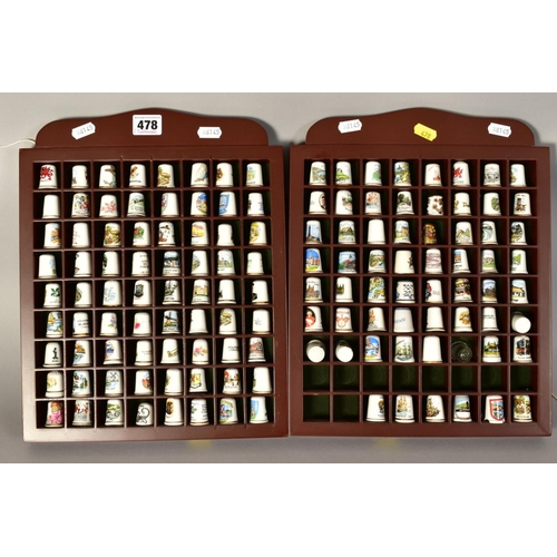 478 - TWO DISPLAY CASES WITH VARIOUS MODERN THIMBLES including glass and cloisonne (over 130)