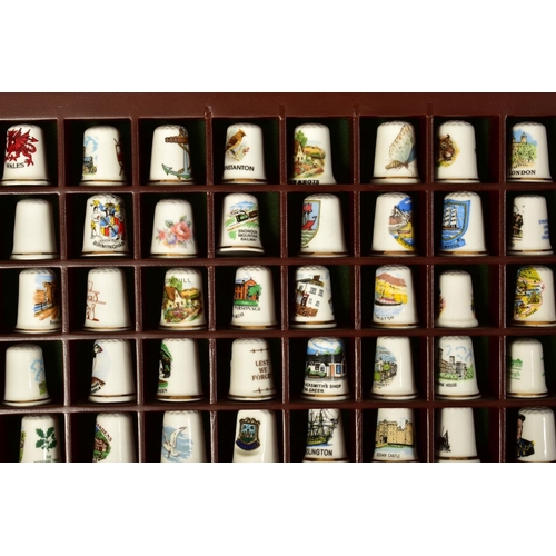 478 - TWO DISPLAY CASES WITH VARIOUS MODERN THIMBLES including glass and cloisonne (over 130)