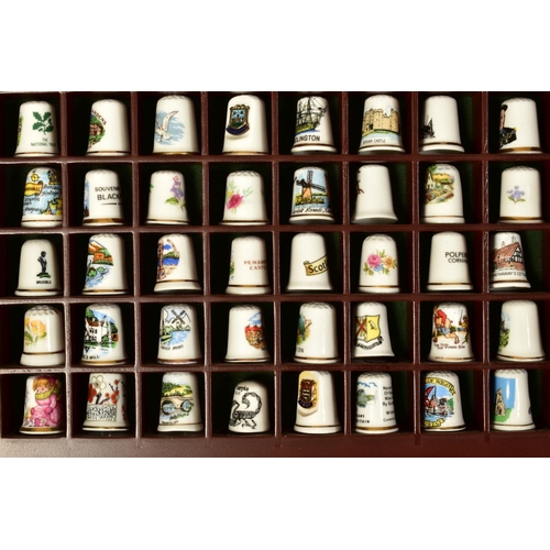 478 - TWO DISPLAY CASES WITH VARIOUS MODERN THIMBLES including glass and cloisonne (over 130)