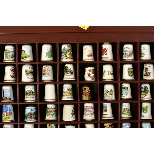 478 - TWO DISPLAY CASES WITH VARIOUS MODERN THIMBLES including glass and cloisonne (over 130)