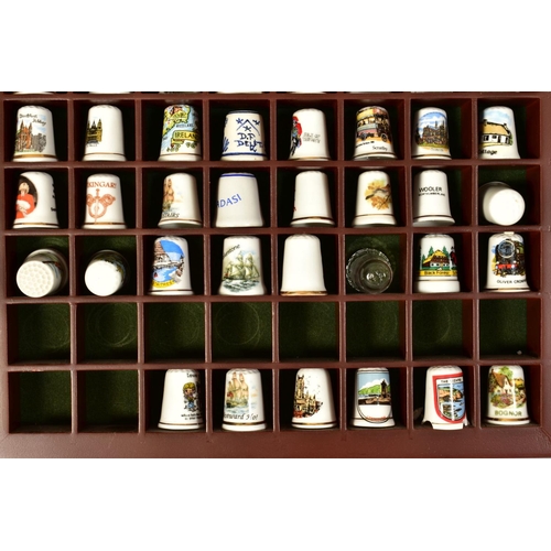 478 - TWO DISPLAY CASES WITH VARIOUS MODERN THIMBLES including glass and cloisonne (over 130)