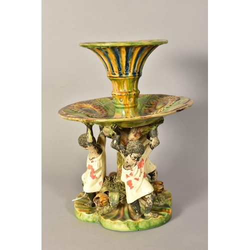 485 - A LATE 19TH CENTURY JOSE A. CUNHA MAJOLICA CENTREPIECE, the trumpet shaped central vase above a circ... 