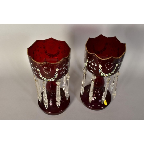 488 - A PAIR OF VICTORIAN RUBY GLASS LUSTRES, painted floral swags and gilt detailing (rubbed) with clear ... 