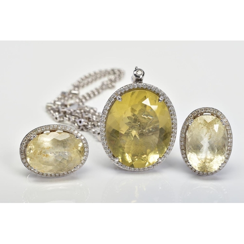 50 - AN 18CT WHITE GOLD, CITRINE AND DIAMOND PENDANT AND MATCHING EARRINGS, the pendant designed as a cen... 