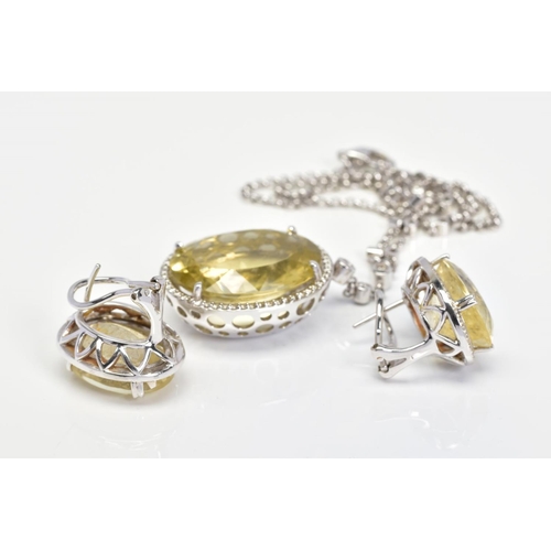 50 - AN 18CT WHITE GOLD, CITRINE AND DIAMOND PENDANT AND MATCHING EARRINGS, the pendant designed as a cen... 