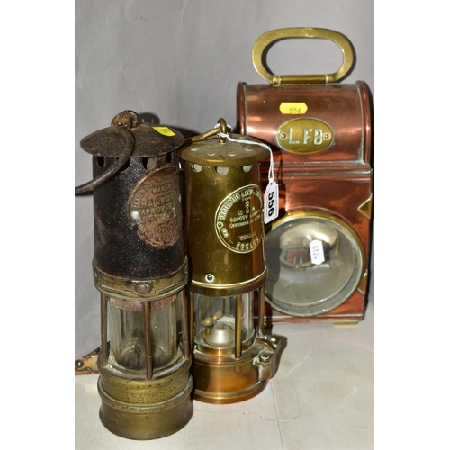 556 - A BRASS AND COPPER LONDON FIRE BRIGADE OIL HAND LAMP with side mount to attach to a vehicle, togethe... 