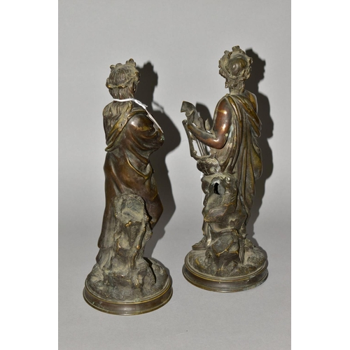 560 - A PAIR OF 19TH CENTURY CONTINENTAL BRONZE FIGURES, in the form of a classical male holding a compani... 