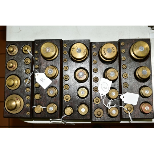 567 - FIVE WOODEN MOUNTED SETS OF BRASS WEIGHTS, as used in French Pharmacies, 500g to 1gram