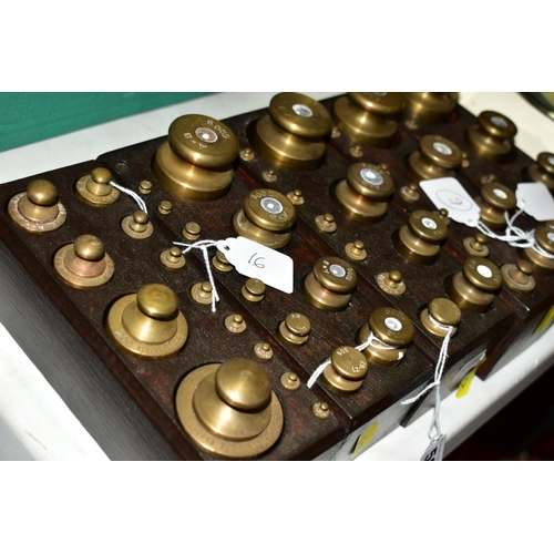 567 - FIVE WOODEN MOUNTED SETS OF BRASS WEIGHTS, as used in French Pharmacies, 500g to 1gram