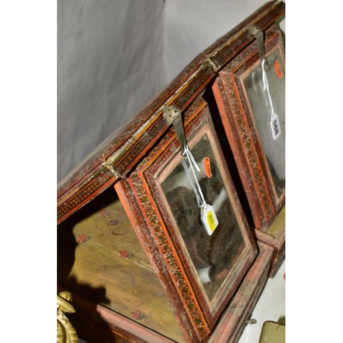 568 - TWO 19TH CENTURY INDIAN TRAVELLING MIRRORS, the rectangular cases with painted and varnished decorat... 