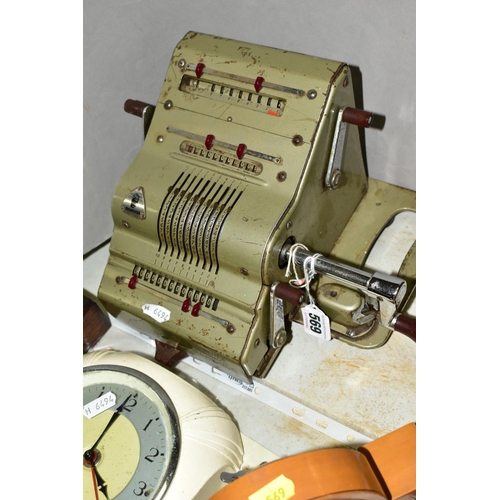 569 - A BRUNSVIGA MECHANICAL CALCULATOR, together with Smith's electric clock, Chinese satellite mechanica... 