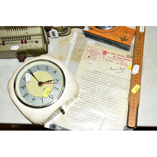 569 - A BRUNSVIGA MECHANICAL CALCULATOR, together with Smith's electric clock, Chinese satellite mechanica... 