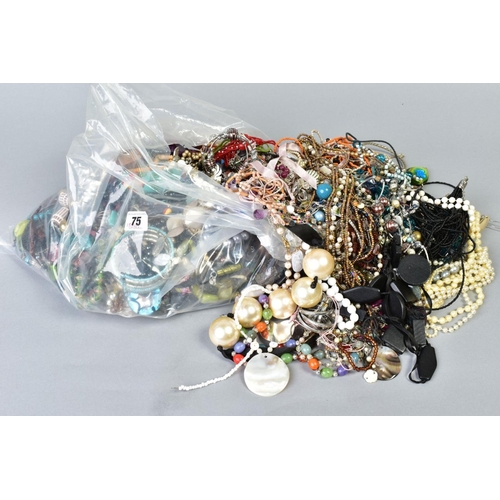 75 - A LARGE BAG OF COSTUME JEWELLERY, to include imitation pearls, bead necklaces, earrings, bracelets e... 