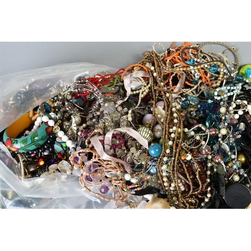 75 - A LARGE BAG OF COSTUME JEWELLERY, to include imitation pearls, bead necklaces, earrings, bracelets e... 