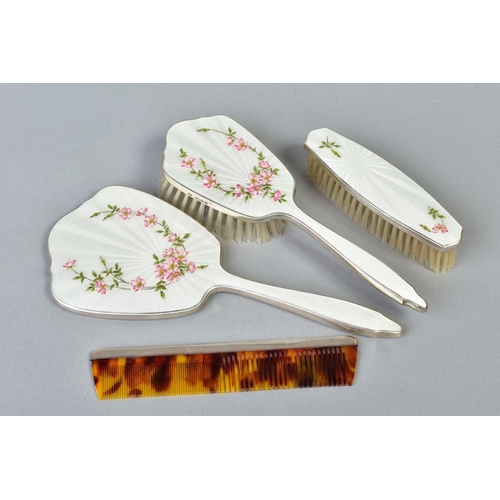 76 - AN ELIZABETH II SILVER AND CREAM ENAMEL THREE PIECE DRESSING TABLE SET, decorated with Dog Rose, mak... 