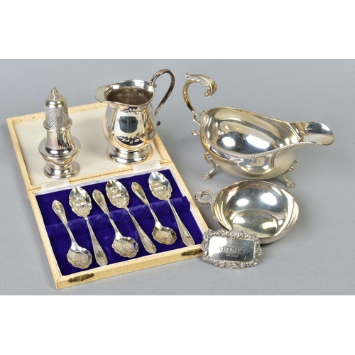 79 - A GROUP OF 20TH CENTURY SILVER, comprising an oval sauceboat, gadrooned rim, S scroll handle, on thr... 