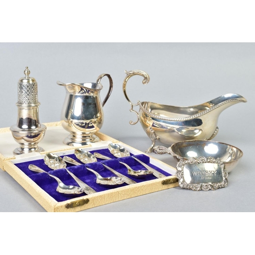 79 - A GROUP OF 20TH CENTURY SILVER, comprising an oval sauceboat, gadrooned rim, S scroll handle, on thr... 