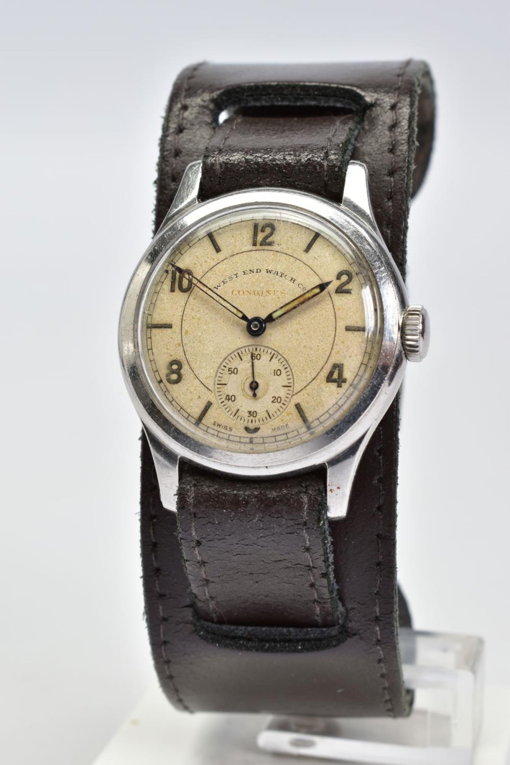 A STAINLESS STEEL INDIAN CIVIL SERVICE WEST END WATCH CO LONGINES