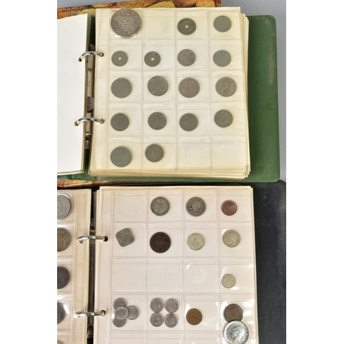 100 - A BISCUIT TIN OF COINS to include two small albums of world coins, some with silver content etc