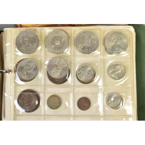 100 - A BISCUIT TIN OF COINS to include two small albums of world coins, some with silver content etc