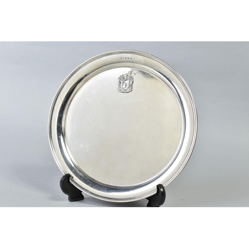 103 - A GEORGE V SILVER CIRCULAR TRAY, bears applied crest style motif, makers James Dixon & Sons Ltd, She... 