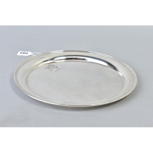 103 - A GEORGE V SILVER CIRCULAR TRAY, bears applied crest style motif, makers James Dixon & Sons Ltd, She... 