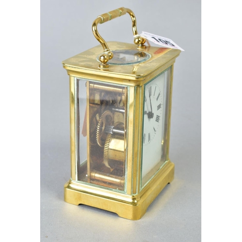 105 - A 20TH CENTURY BRASS CASED CARRIAGE CLOCK, white dial, Roman numerals, marked ACC L to the back plat... 