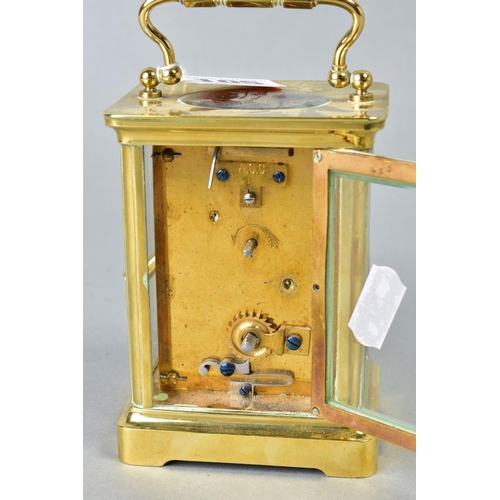 105 - A 20TH CENTURY BRASS CASED CARRIAGE CLOCK, white dial, Roman numerals, marked ACC L to the back plat... 