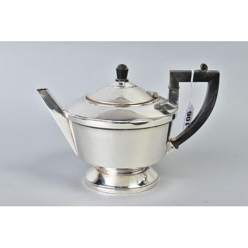 106 - A GEORGE VI SILVER CIRCULAR TEAPOT, black bakelite fitments, makers A.L. Davenport Ltd, Birmingham 1... 