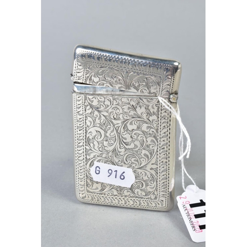 111 - AN EDWARDIAN SILVER CARD CASE, rectangular outline, foliate engraved decoration back and front, shie... 