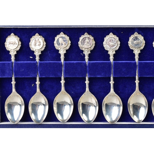 126 - A CASED SET OF ELIZABETH II SILVER LIMITED EDITION 'THE TWELVE ZODIAC SPOONS' sculpted by David Corn... 