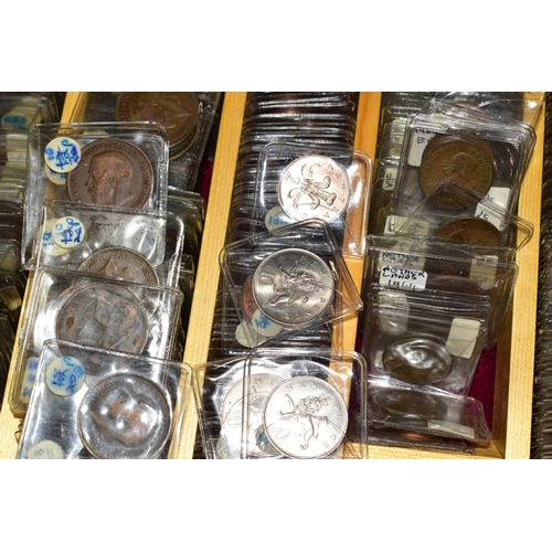 128 - A LARGE COLLECTION OF COINS AND COMMEMORATIVES to include four purpose made coin cases, 24'' x 18'' ... 