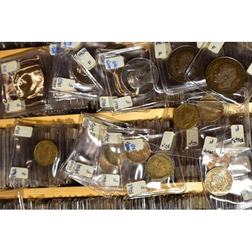 128 - A LARGE COLLECTION OF COINS AND COMMEMORATIVES to include four purpose made coin cases, 24'' x 18'' ... 