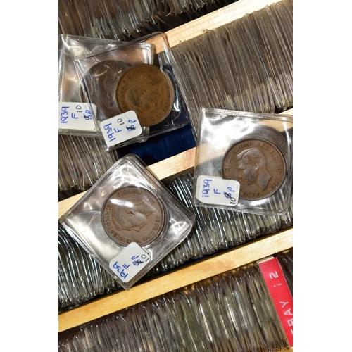 128 - A LARGE COLLECTION OF COINS AND COMMEMORATIVES to include four purpose made coin cases, 24'' x 18'' ... 