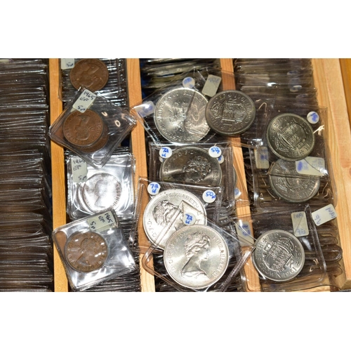 128 - A LARGE COLLECTION OF COINS AND COMMEMORATIVES to include four purpose made coin cases, 24'' x 18'' ... 