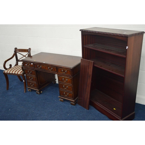 1288 - A REPRODUCTION MAHOGANY STRUNG INLAY PEDESTAL DESK with nine assorted drawers together with a carver... 