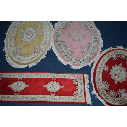 1290 - A COLLECTION OF G H FIRTH FOUR WOOLLEN RUGS to include two large oval in pink and yellow, 250cm x 16... 