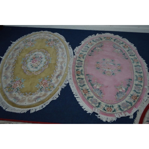 1290 - A COLLECTION OF G H FIRTH FOUR WOOLLEN RUGS to include two large oval in pink and yellow, 250cm x 16... 