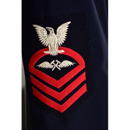 131 - FOUR NAVAL DRESS JACKETS, with sleeve insignia and medal ribbons