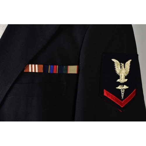 131 - FOUR NAVAL DRESS JACKETS, with sleeve insignia and medal ribbons